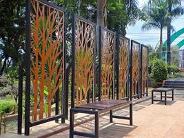 Metal Privacy Screen Fence, Metal Tree Wall Art, gold and black in frame, this was shot at square park photo