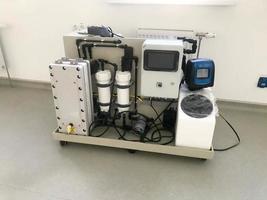 An industrial professional good water treatment system based on reverse osmosis for the production of clean water for industrial, laboratory and medical use photo