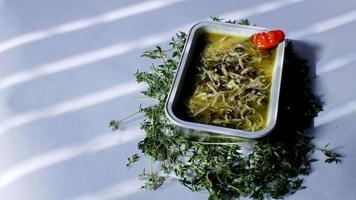 Indonesian food with aluminum foil photo