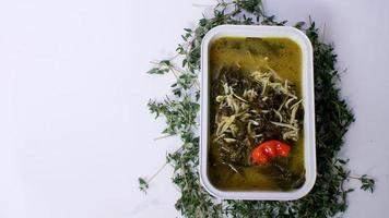 Indonesian food with aluminum foil photo