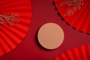 Mock up podium round stage or pedestal and paper fans Chinese new year symbol top view photo