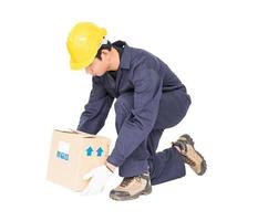 Man in uniform lifting the paper box photo