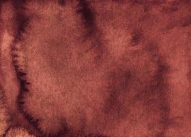 Watercolor old rusty red color background. Elegant deep red backdrop texture. Stains on paper. photo