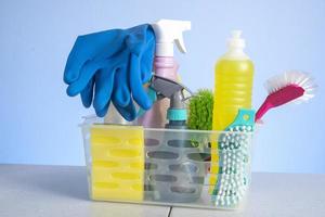 basket with cleaning products for home hygiene use photo