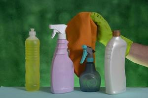 basket with cleaning products for home hygiene use photo