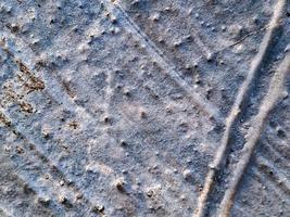 textura de pared de hormigón fondo de cemento grueso gris interior en blanco para edición de texto presente en el espacio libre como telón de fondo foto