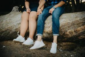 feet of bride and groom, wedding shoes photo