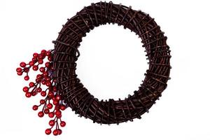 Wreath woven from the branches of the vine isolated , Place for text photo