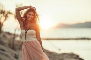 Woman Enjoying A Summer Vacation At The Beach photo