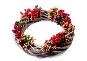 Wreath woven from the branches of the vine isolated , Place for text photo