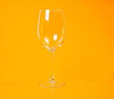 empty glass empty jar empty ice bucket on orange background photo