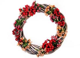 Wreath woven from the branches of the vine isolated , Place for text photo