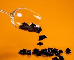 keyboard button in glass in jar in bucket on orange background photo