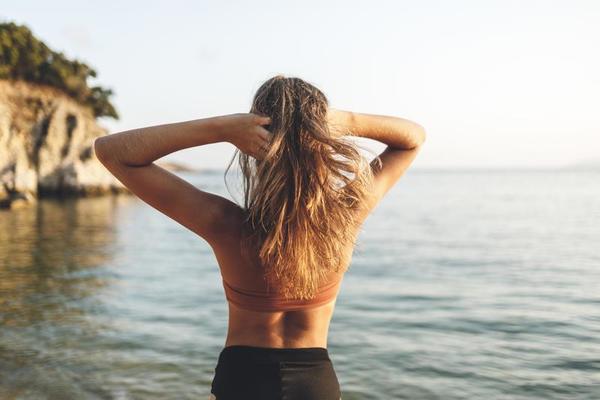 Teenager Girl Enjoying At The Beach 13880405 Stock Photo at Vecteezy