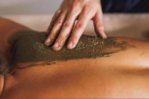 Back Massage With Mud And Seaweed photo