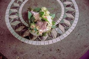 Wedding bouquet made of white roses photo