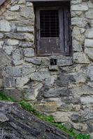 Old rural house with thatched roof photo