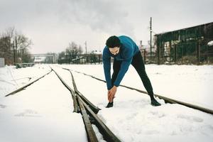 estirandose en la nieve foto