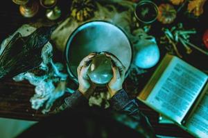 Magic Ball In Witch's Hands photo