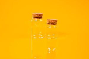 empty glass empty jar empty ice bucket on orange background photo