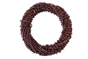 Wreath woven from the branches of the vine isolated , Place for text photo