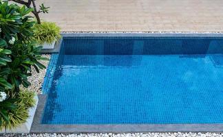 Swimming pool with view garden. photo