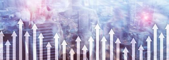 Up arrow graph on skyscraper background. Invesment and financial growth concept. photo