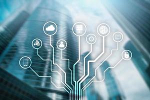 Telecommunication and IOT concept on blurred business center background. photo