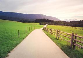 Beautiful street to the hills with sunshine photo