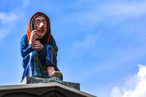 Wernigerode saxony-Anhalt Germany 2010 Witch figure on roof of a house Brocken Harz Germany. photo