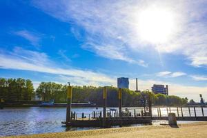 Weser river with dike industry and recreation in Bremen Germany. photo