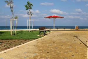 Pedestrian road in the city park on the seashore. photo