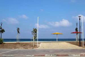 Pedestrian road in the city park on the seashore. photo