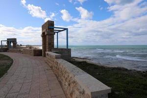 Pedestrian road in the city park on the seashore. photo