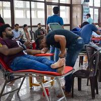 Delhi, India, June 19 2022 - Blood donor at Blood donation camp held at Balaji Temple, Vivek Vihar, Delhi, India, Image for World blood donor day on June 14 every year, Blood Donation Camp at Temple photo