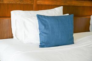 comfortable pillows and white pillows on bed photo