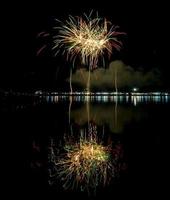 Amazing Beautiful firework on black background for celebration anniversary merry christmas eve and happy new year photo