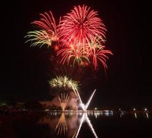Amazing Beautiful firework on black background for celebration anniversary merry christmas eve and happy new year photo