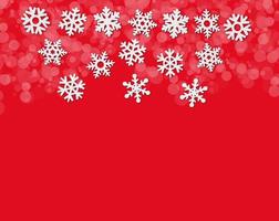 marco de copos de nieve sobre un fondo rojo, vista superior de la composición navideña, espacio de copia foto