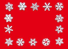 Snowflake frame on a red background, Christmas holiday composition top view, copy space photo