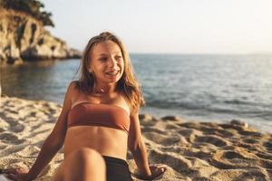 Teenager Girl Enjoying At The Beach photo