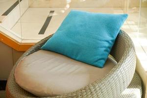 comfortable pillows on wicker chair photo