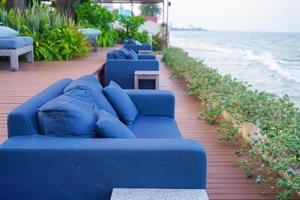 outdoor sofa with sea beach view photo