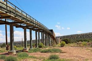 Large Conveyor Belt Going To Top Of High Desert Hill photo