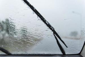 Blurred image of a raindrops on the windshield. photo