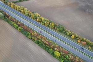 British Motorways, roads and highways passing through countryside of England. aerial view with drone's camera photo