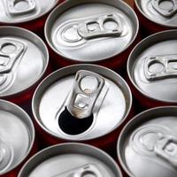 Many aluminium soda drink cans. Advertising for Soda drinks or tin cans mass manufacturing photo