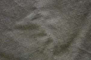 The texture of a very old brown sack cloth. Retro texture with canvas material. Background image with copy space photo