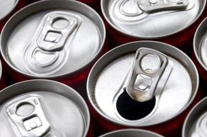 Many aluminium soda drink cans. Advertising for Soda drinks or tin cans mass manufacturing photo