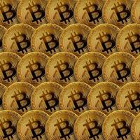 Pattern of many golden bitcoins. Cryptocurrency mining concept photo